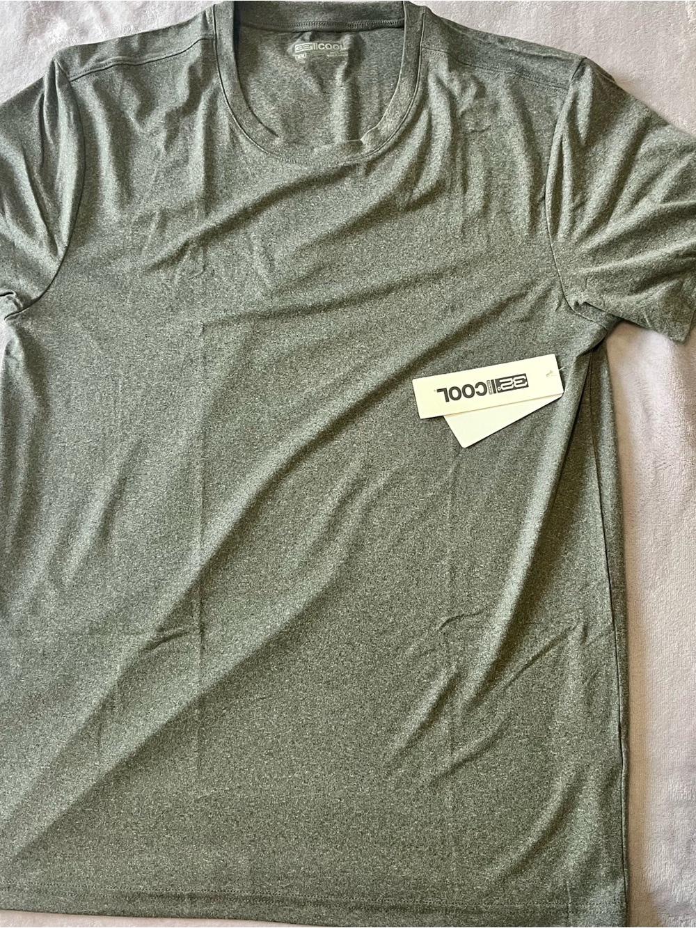 Soft olive short-sleeve active tee. Lightweight, breathable fabric with moisture